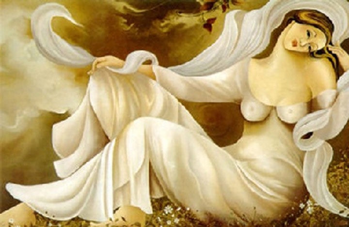 Lady wearing a white long gown.