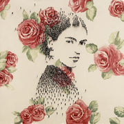 Miniature images of people forming a portrait of Frida Kahlo, with reddish wallpaper of roses.