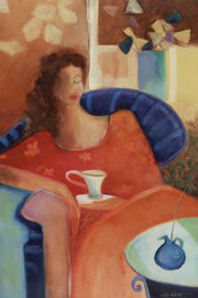 Lady sitting enjoying her morning tea.