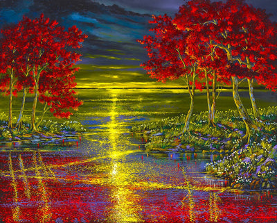 Red trees reflect on the waterfront