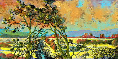 Lone tree in the vast landscape, with golden clouds above