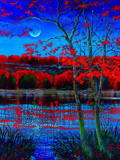 beautiful blue sky and moon reflect the red topped tree into the waters edge
