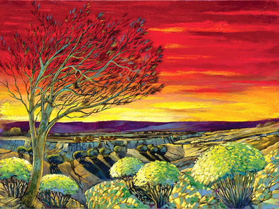 lone tree stands above the other in a autumn sunset sky